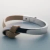 Ormé Armreif Edition Silber in Rhodium mit taupefarbenem Leder